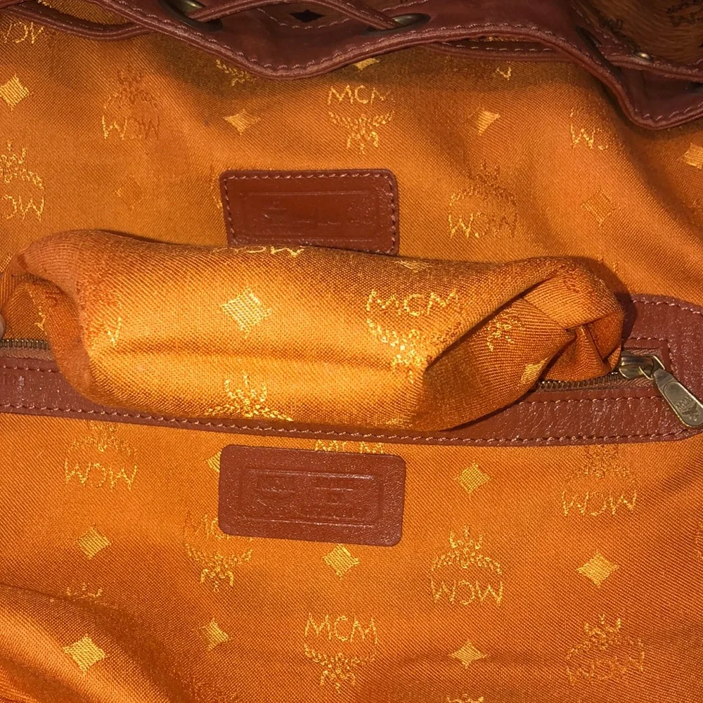 MCM Visetos Cognac Leather Monogram Bucket Drawstring Crossbody Bag EUC